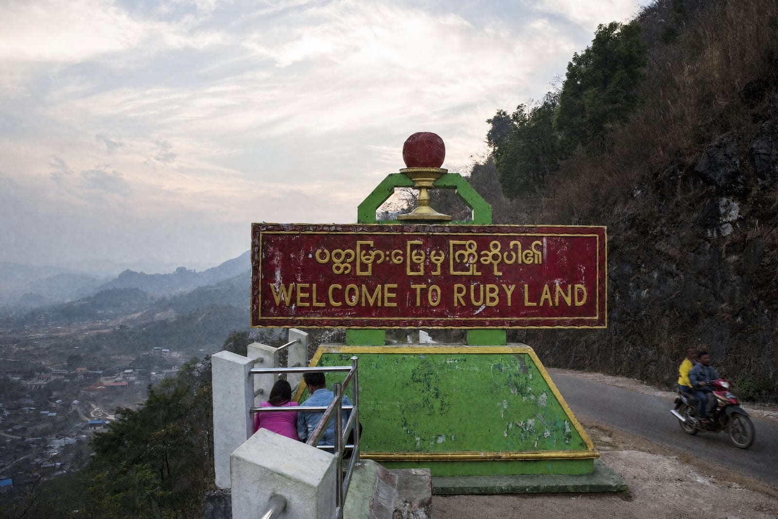 The 'Welcome to Ruby Land' sign on the road into Mogok